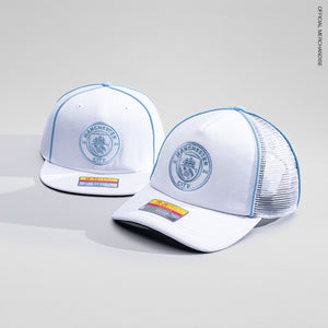 Manchester City Cali Day Snapback and Manchester City Cali Day Trucker on a grey background.