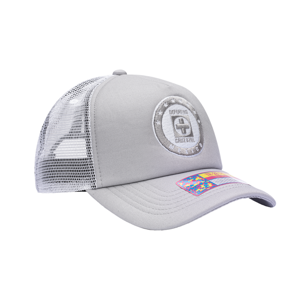 Side view of the Cruz Azul Fog Trucker Hat in Grey/White, with high crown, curved peak, mesh back and snapback closure.
