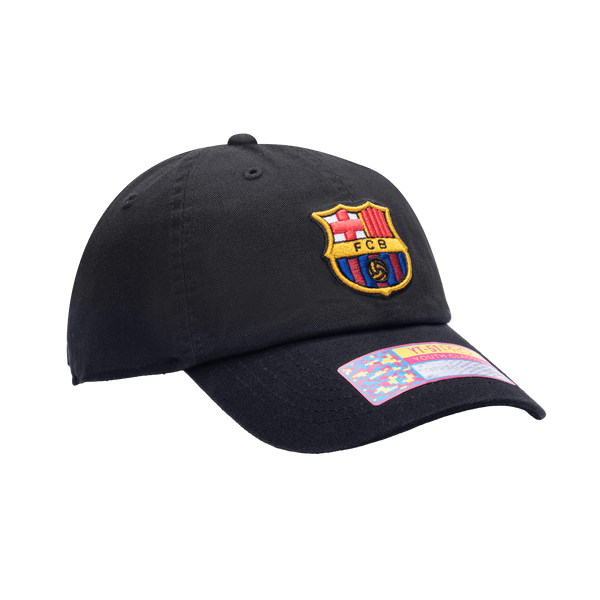 Side view of the FC Barcelona Bambo Kids Classic hat with low unstructured crown, curved peak brim, and buckle closure, in black.